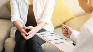 Woman in consultation with doctor to discuss breast reconstruction options